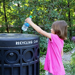 Girl recycling